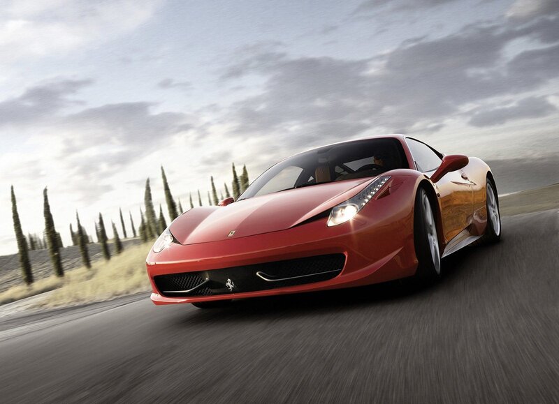 Red Ferrari on a country road