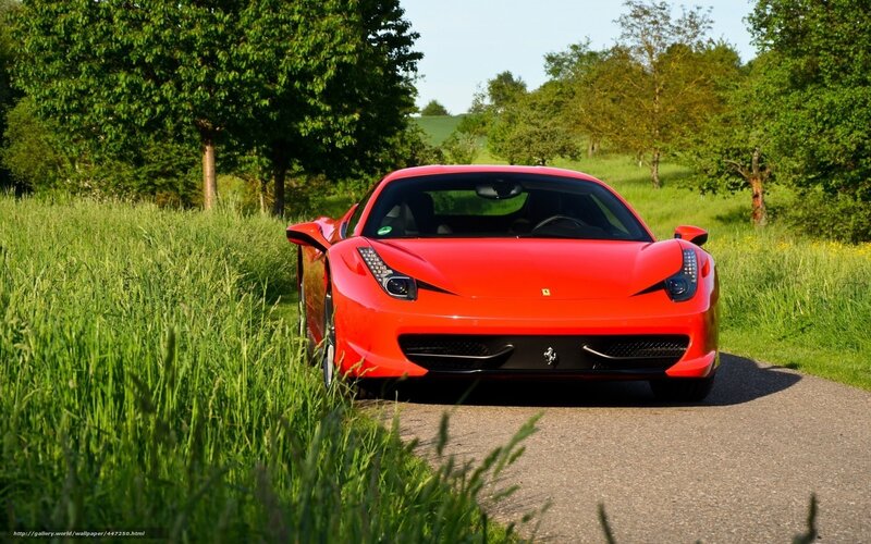 Red Ferrari on a country road
