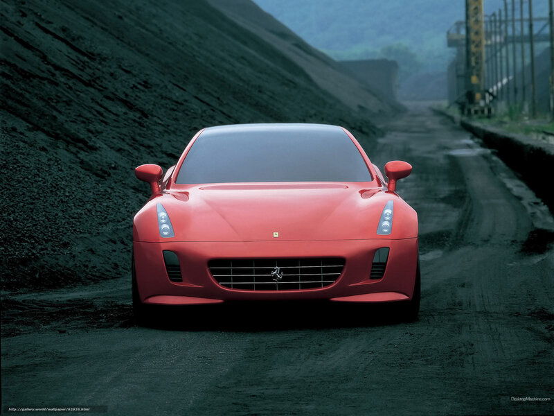 Red Ferrari on a dirt road