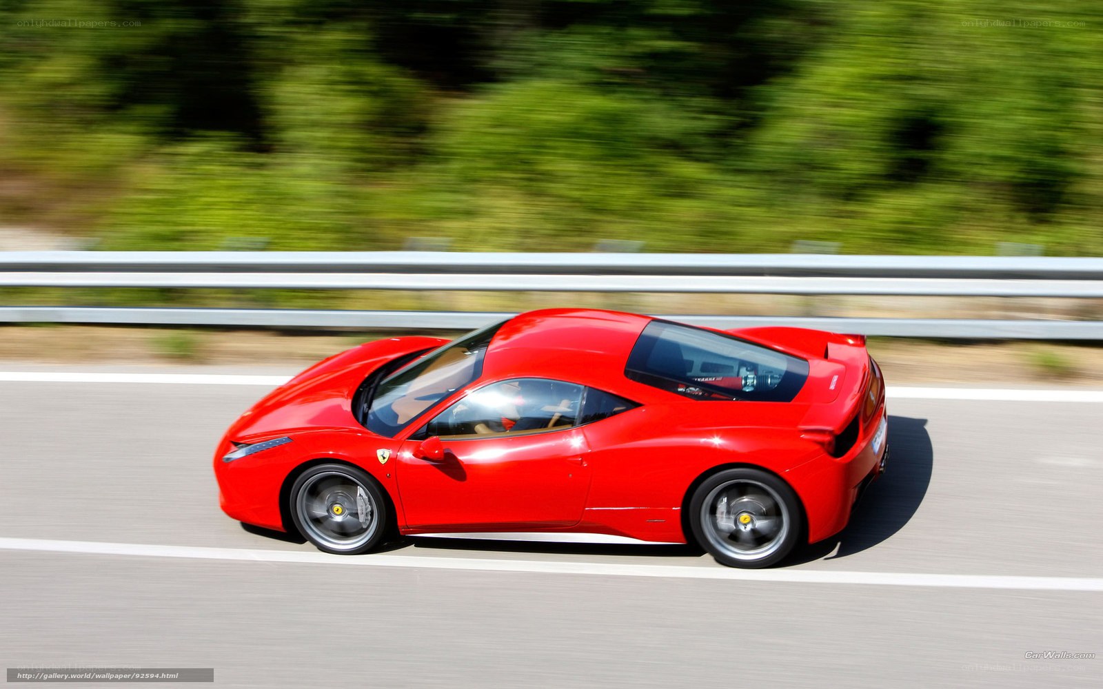 Red Ferrari on a highway