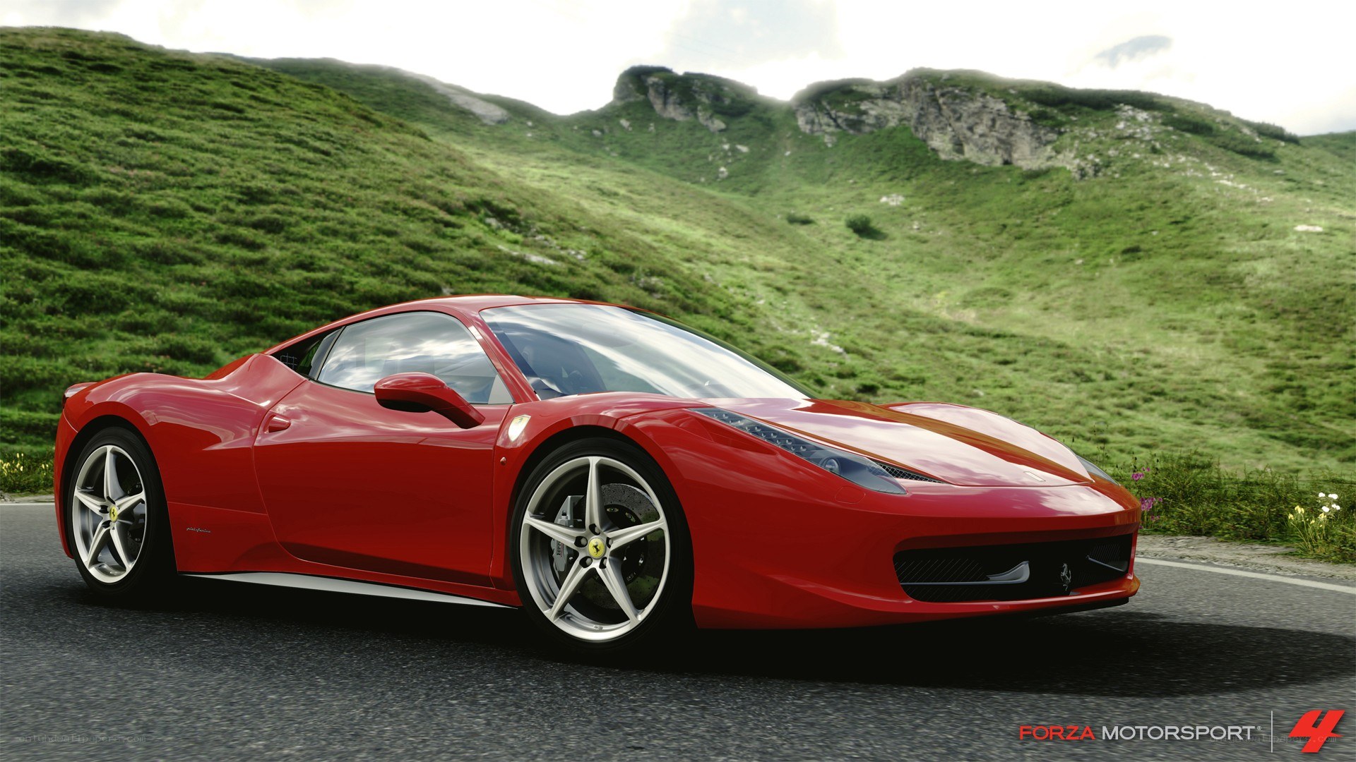 Red Ferrari on a mountain road
