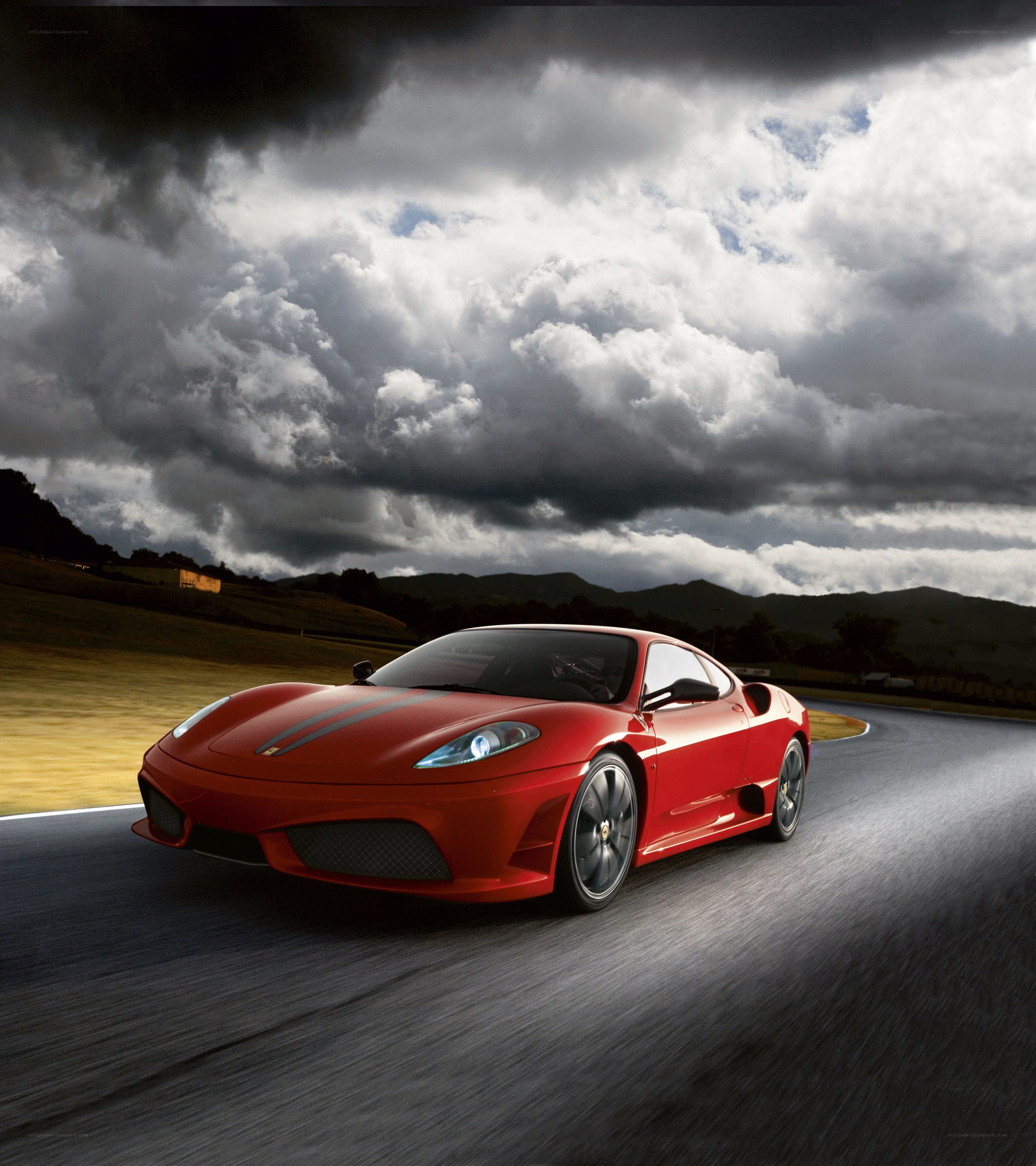 Red Ferrari on a racetrack