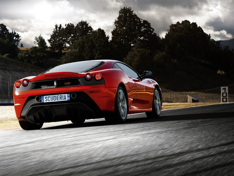 Red Ferrari on a racetrack