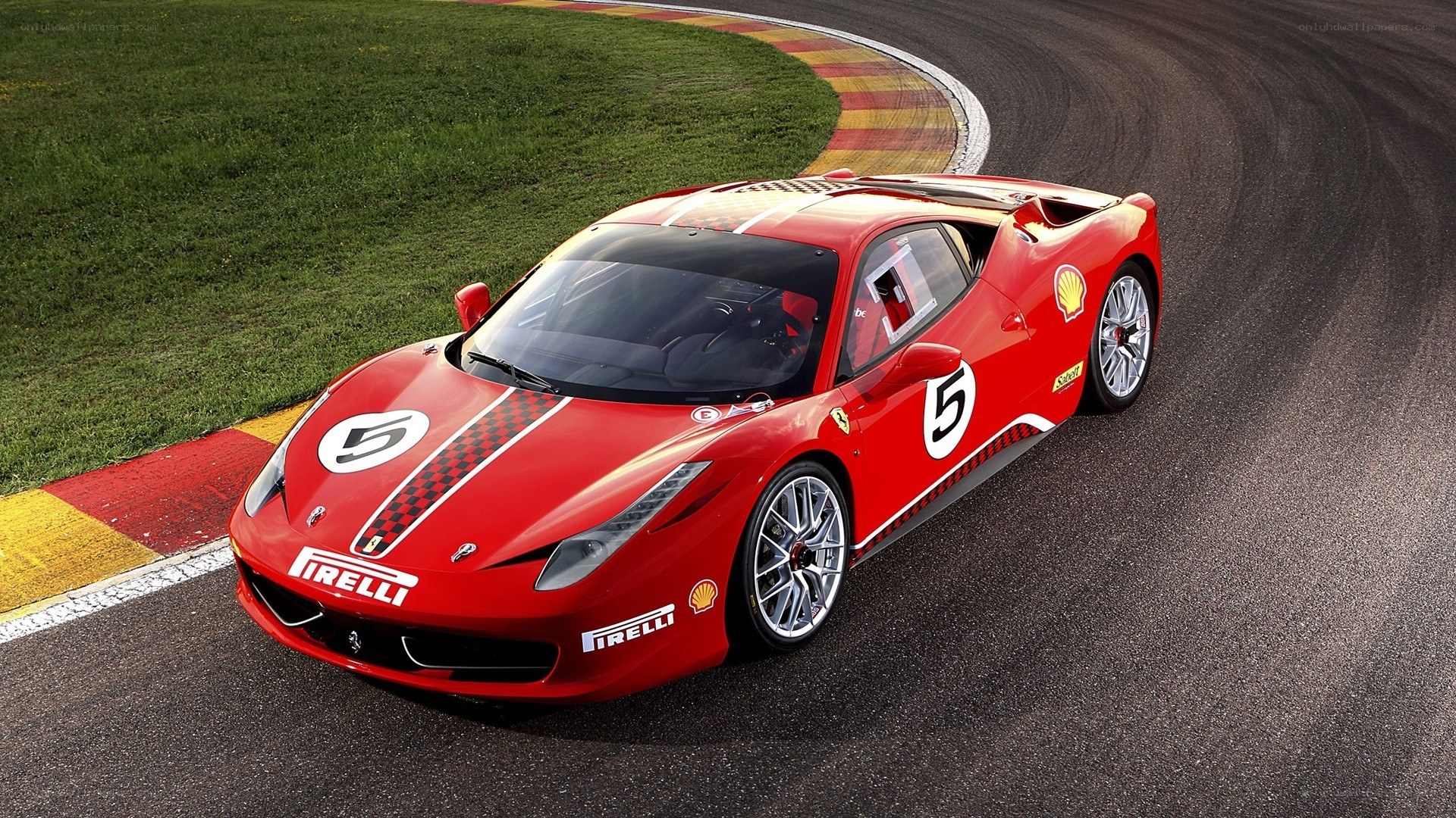 Red Ferrari on a racetrack