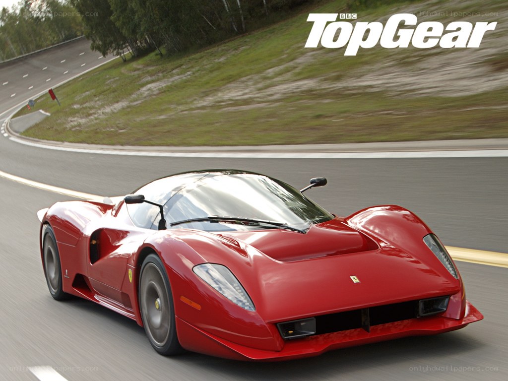 Red Ferrari on a racetrack