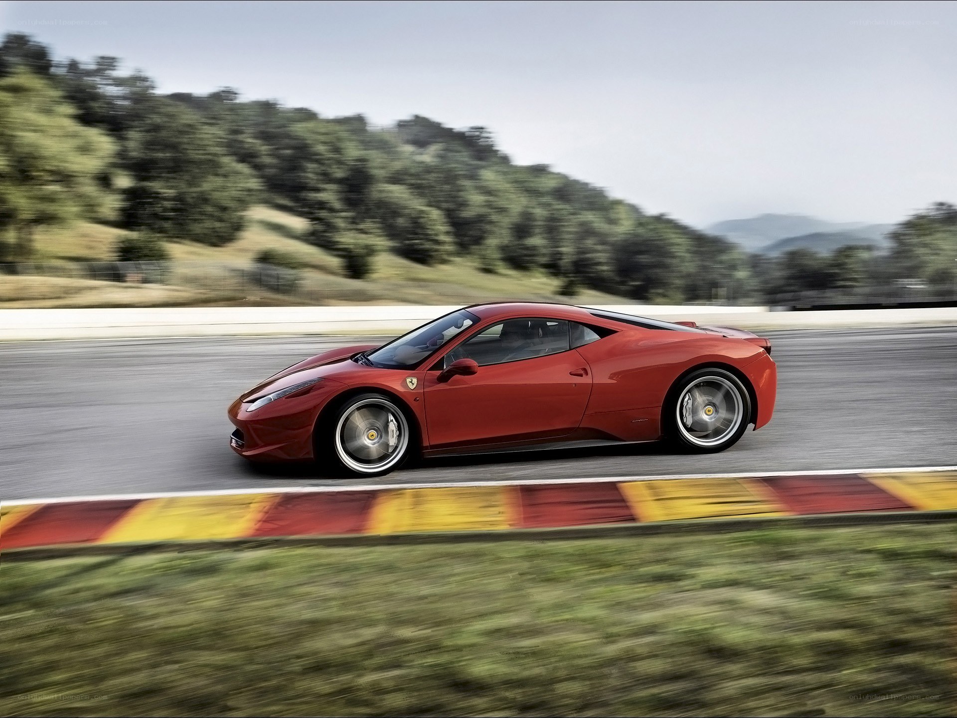 Red Ferrari on a racetrack