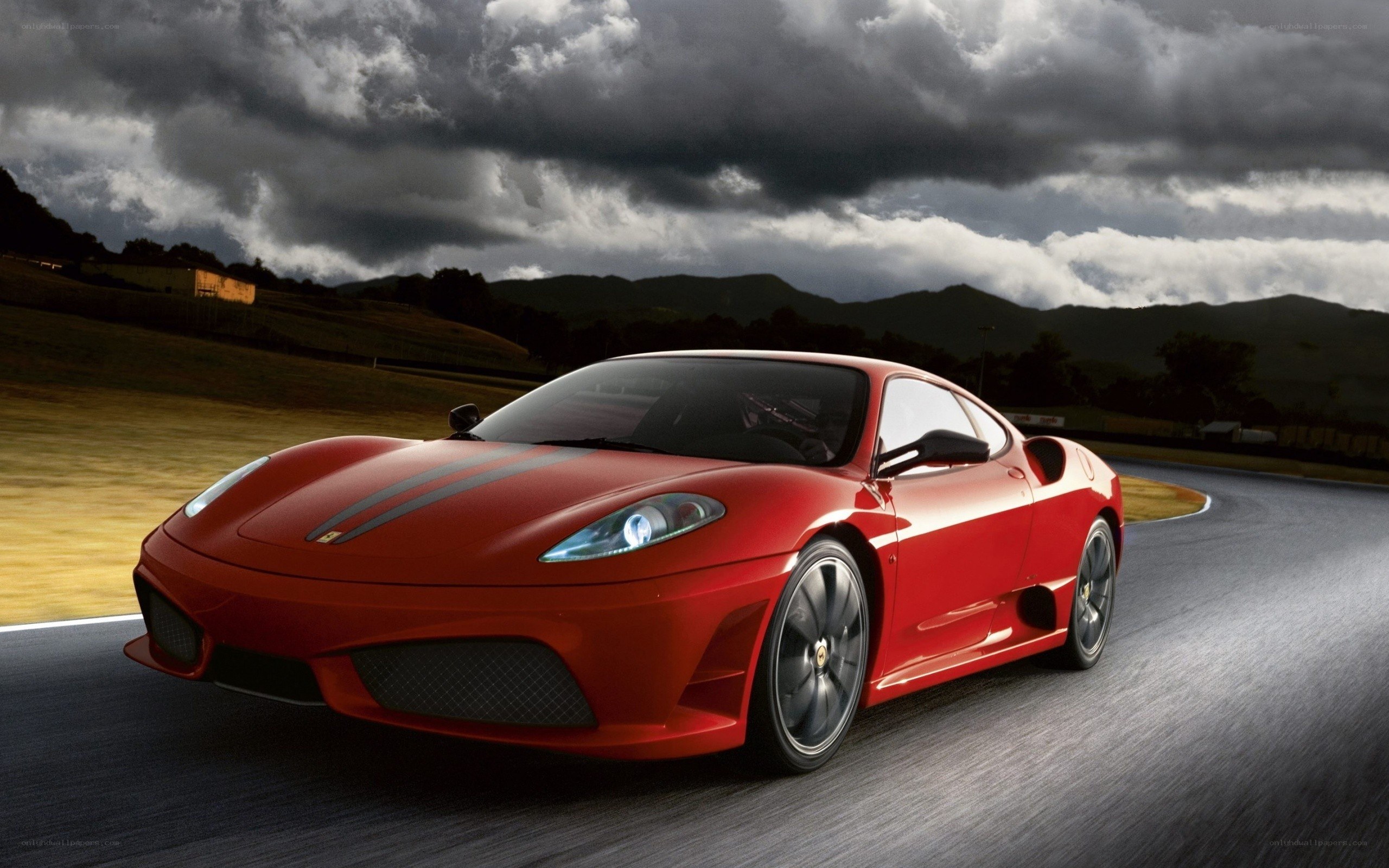 Red Ferrari on a racetrack