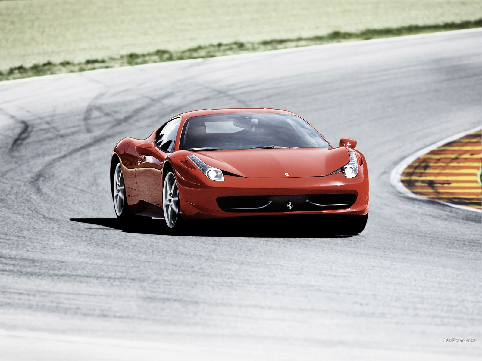Red Ferrari on a racetrack