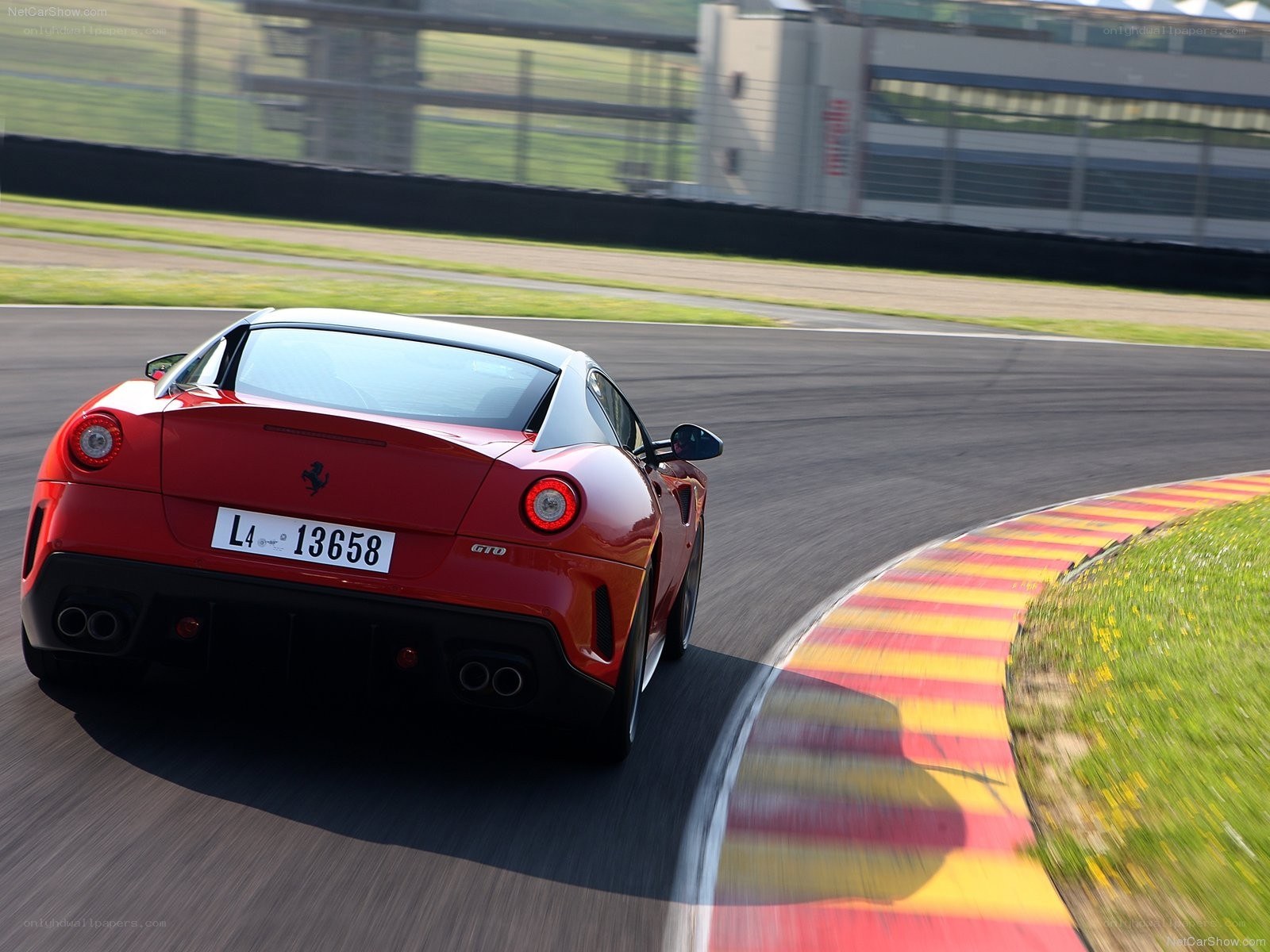 Red Ferrari on a racetrack