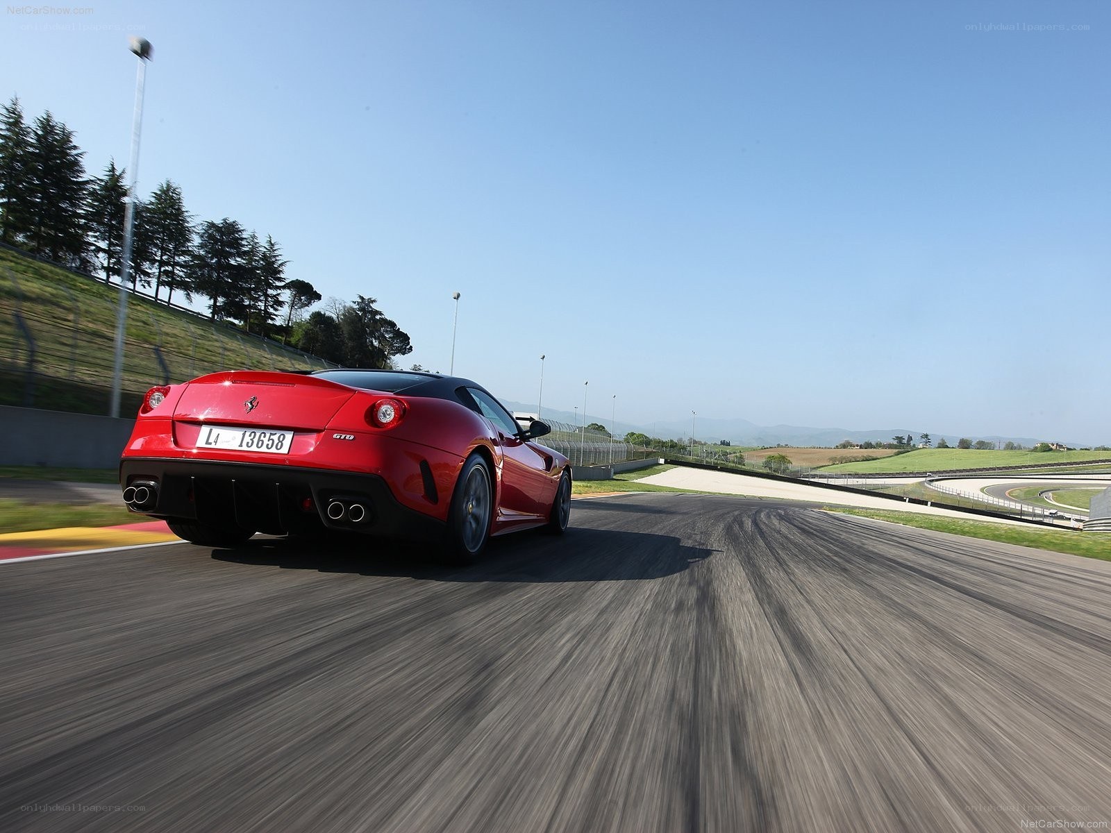 Red Ferrari on a racetrack