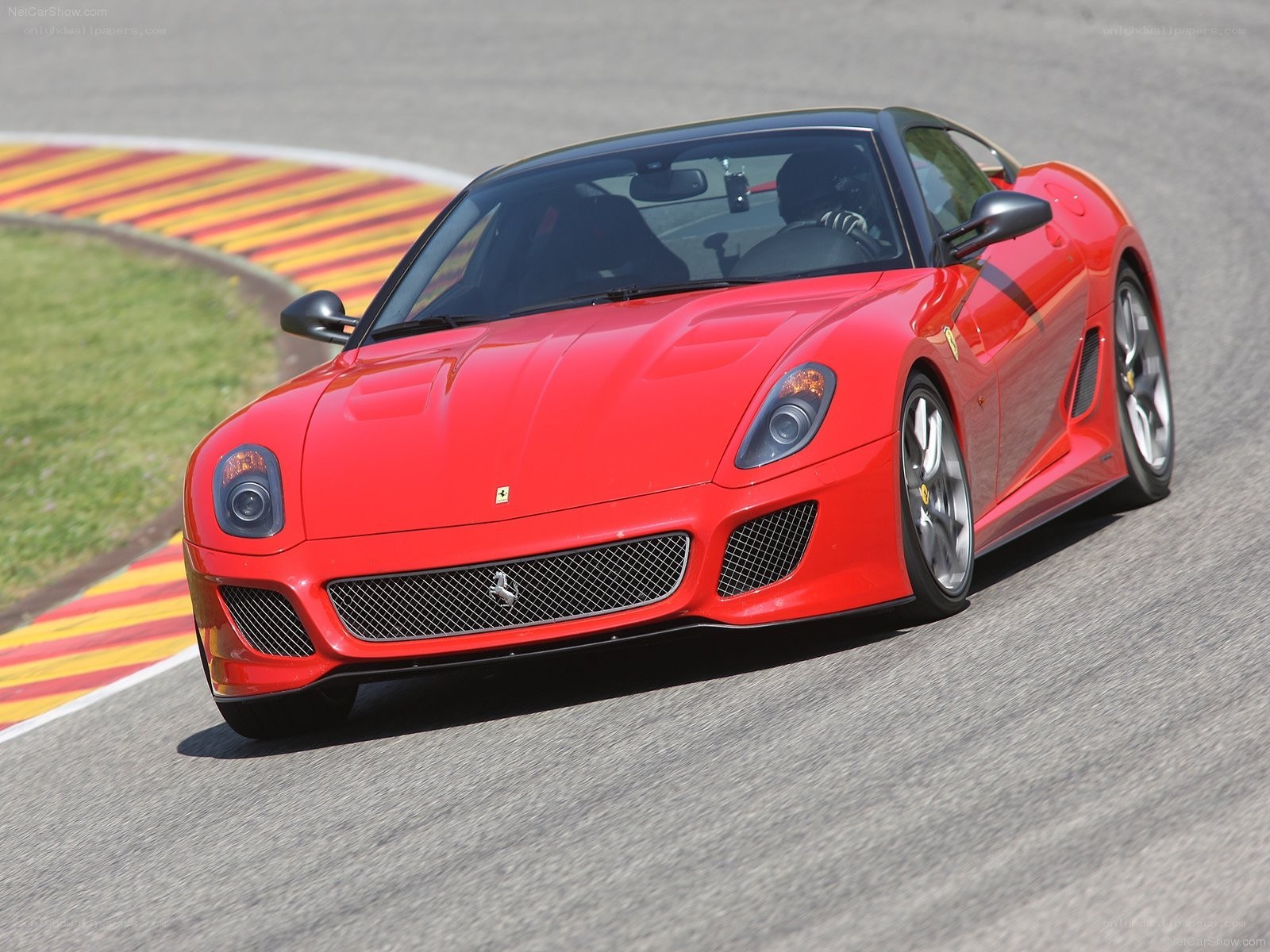 Red Ferrari on a racetrack