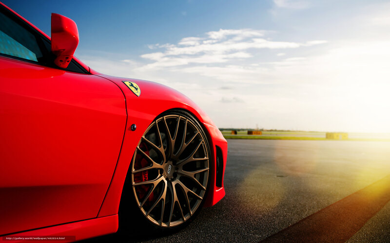 Red Ferrari on a racetrack