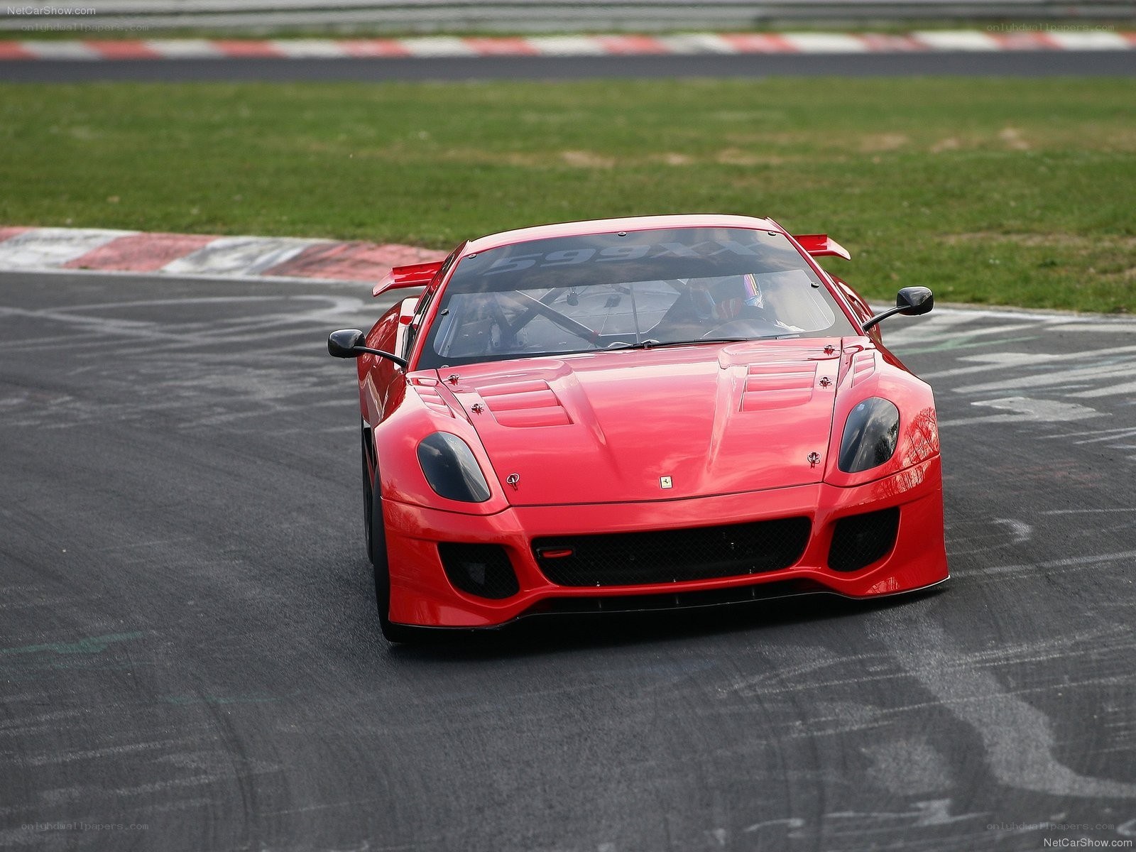 Red Ferrari on a racetrack