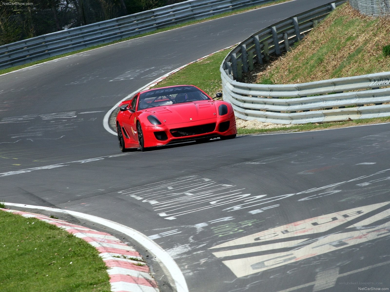 Red Ferrari on a racetrack