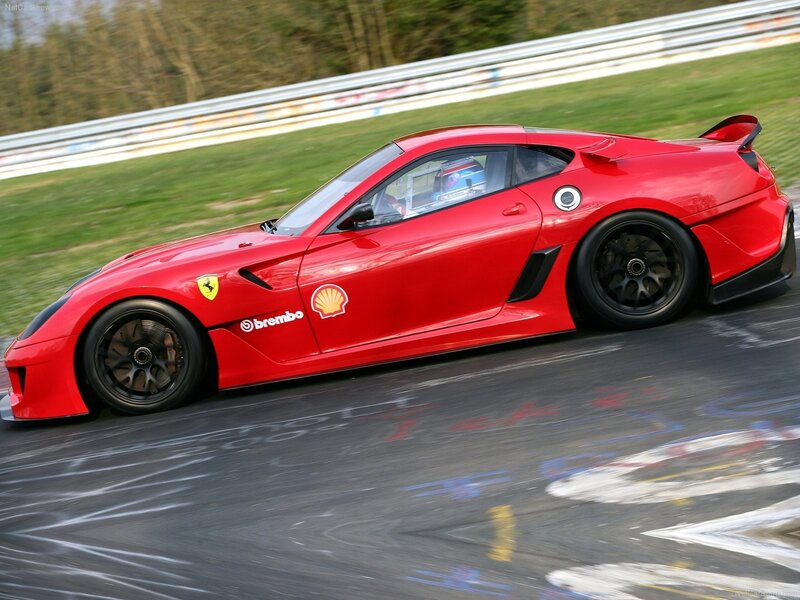 Red Ferrari on a racetrack