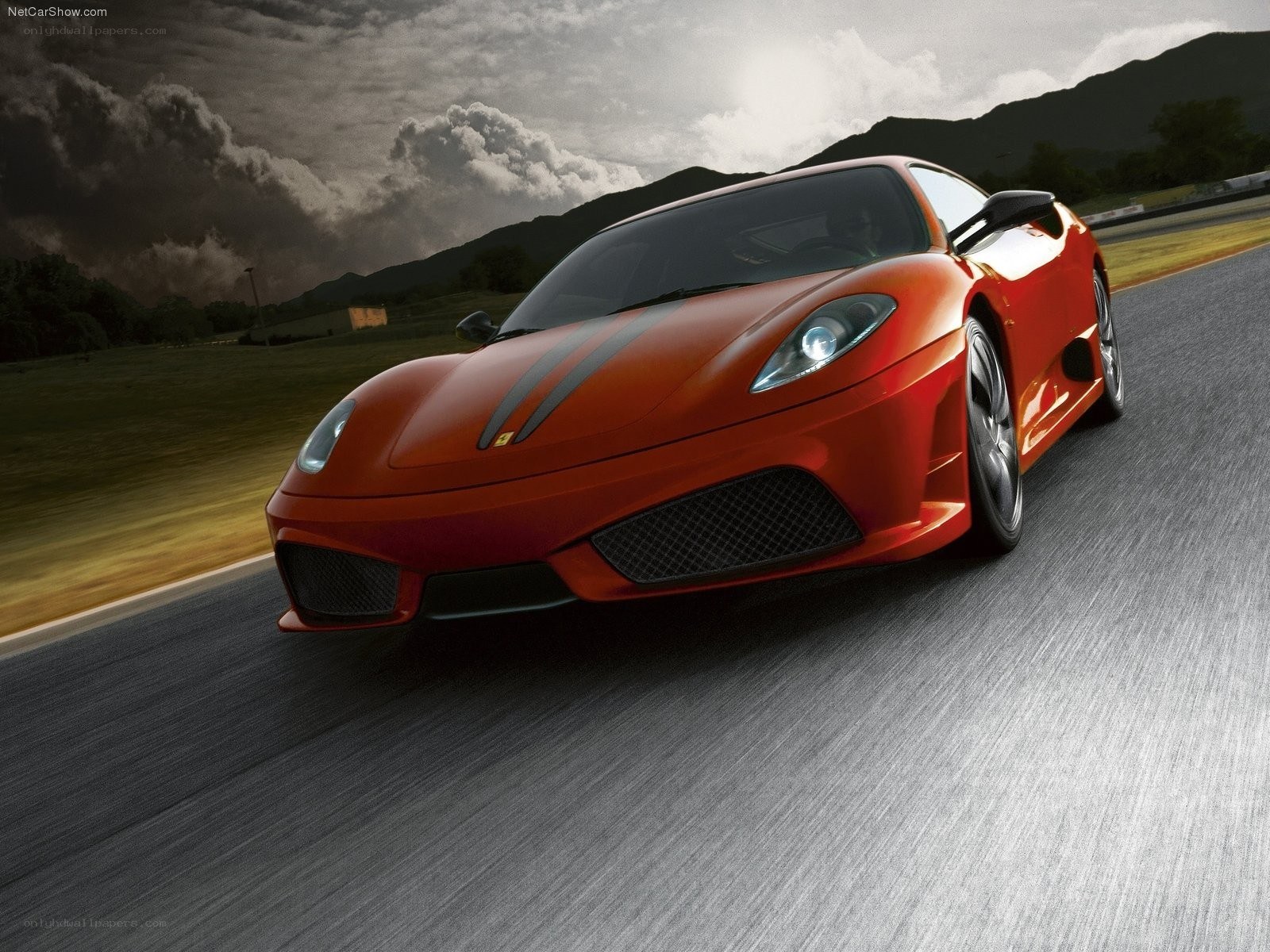 Red Ferrari on a racetrack