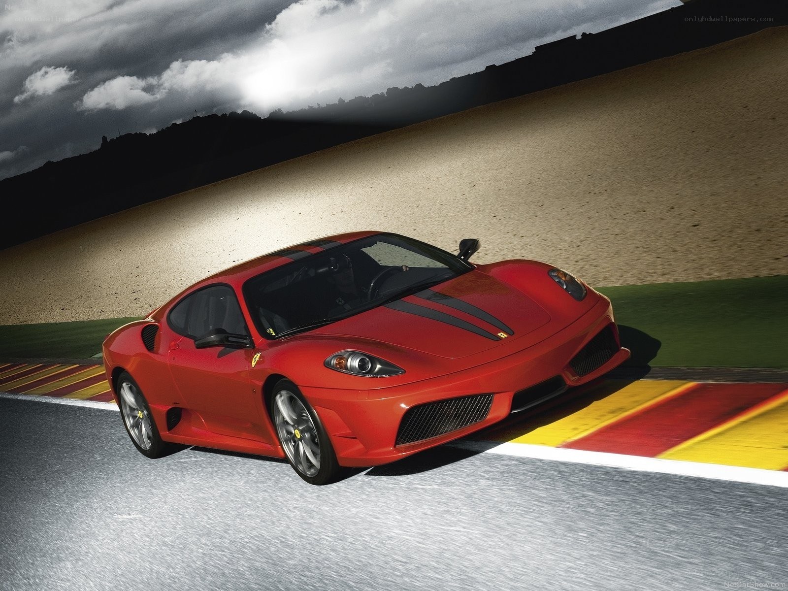 Red Ferrari on a racetrack