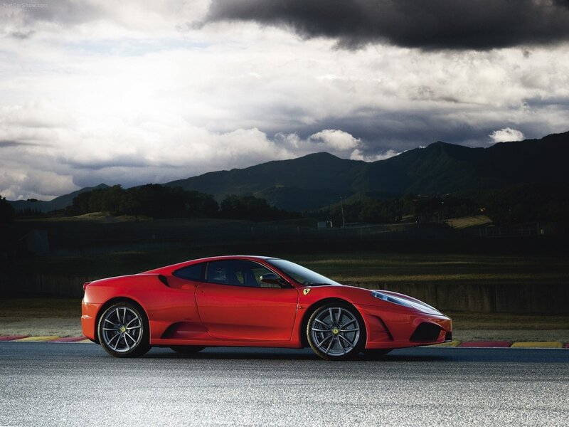 Red Ferrari on a racetrack
