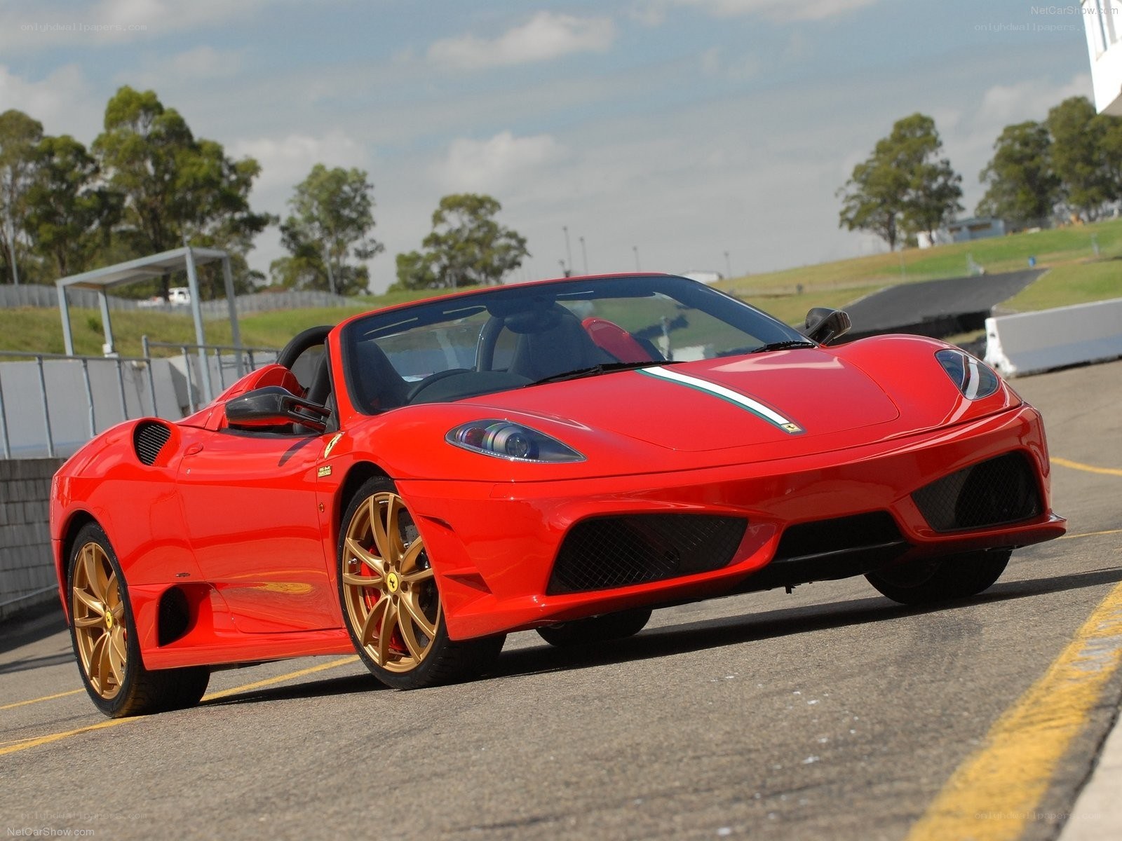 Red Ferrari on a racetrack