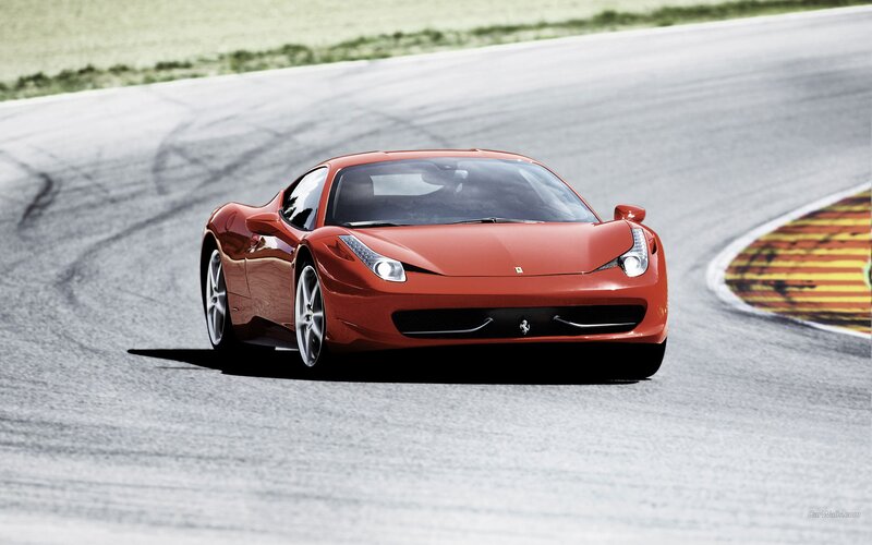 Red Ferrari on a racetrack