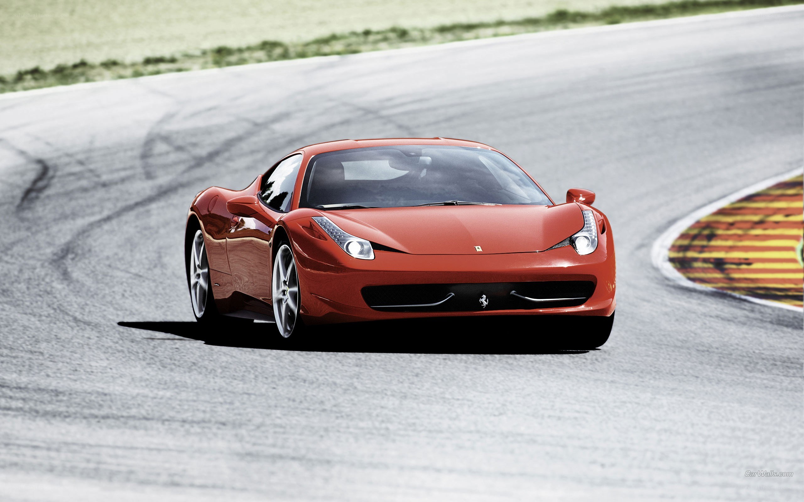 Red Ferrari on a racetrack