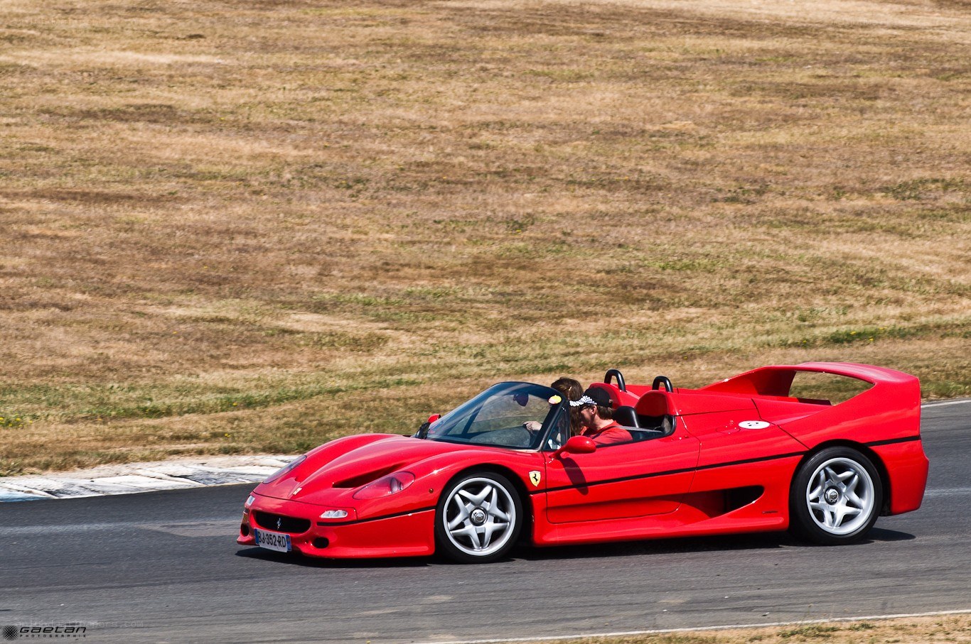 Red Ferrari on a racetrack