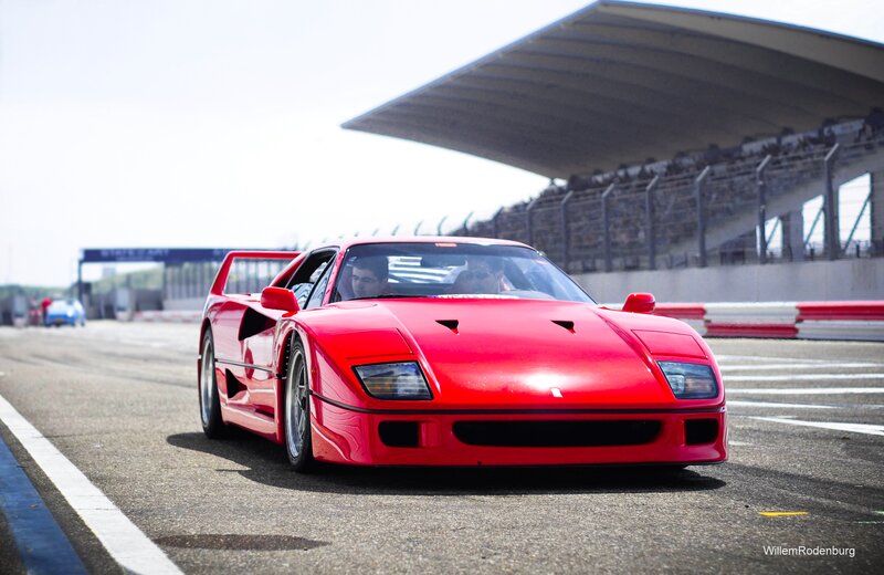 Red Ferrari on a racetrack