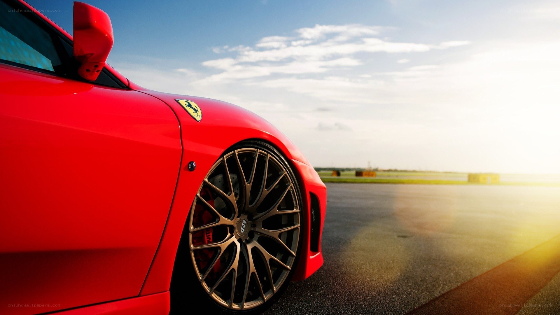 Red Ferrari on a racetrack