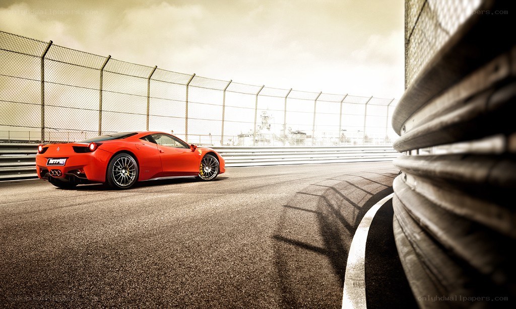 Red Ferrari on a racetrack