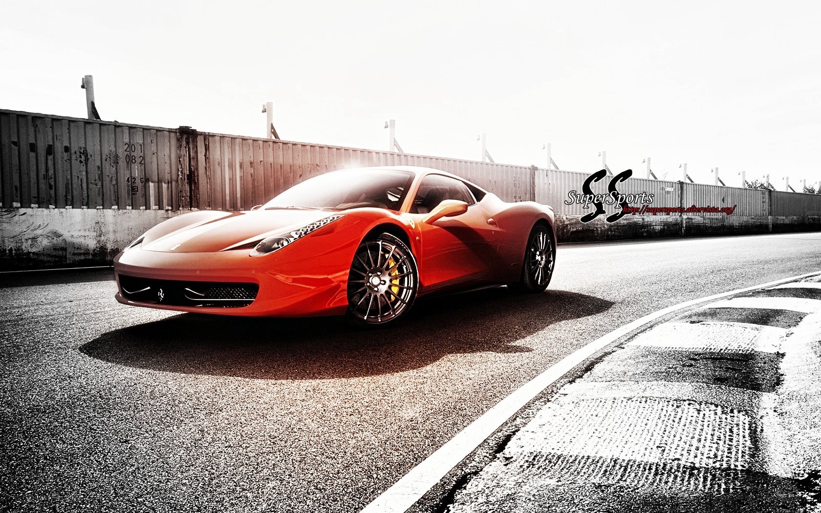 Red Ferrari on a racetrack