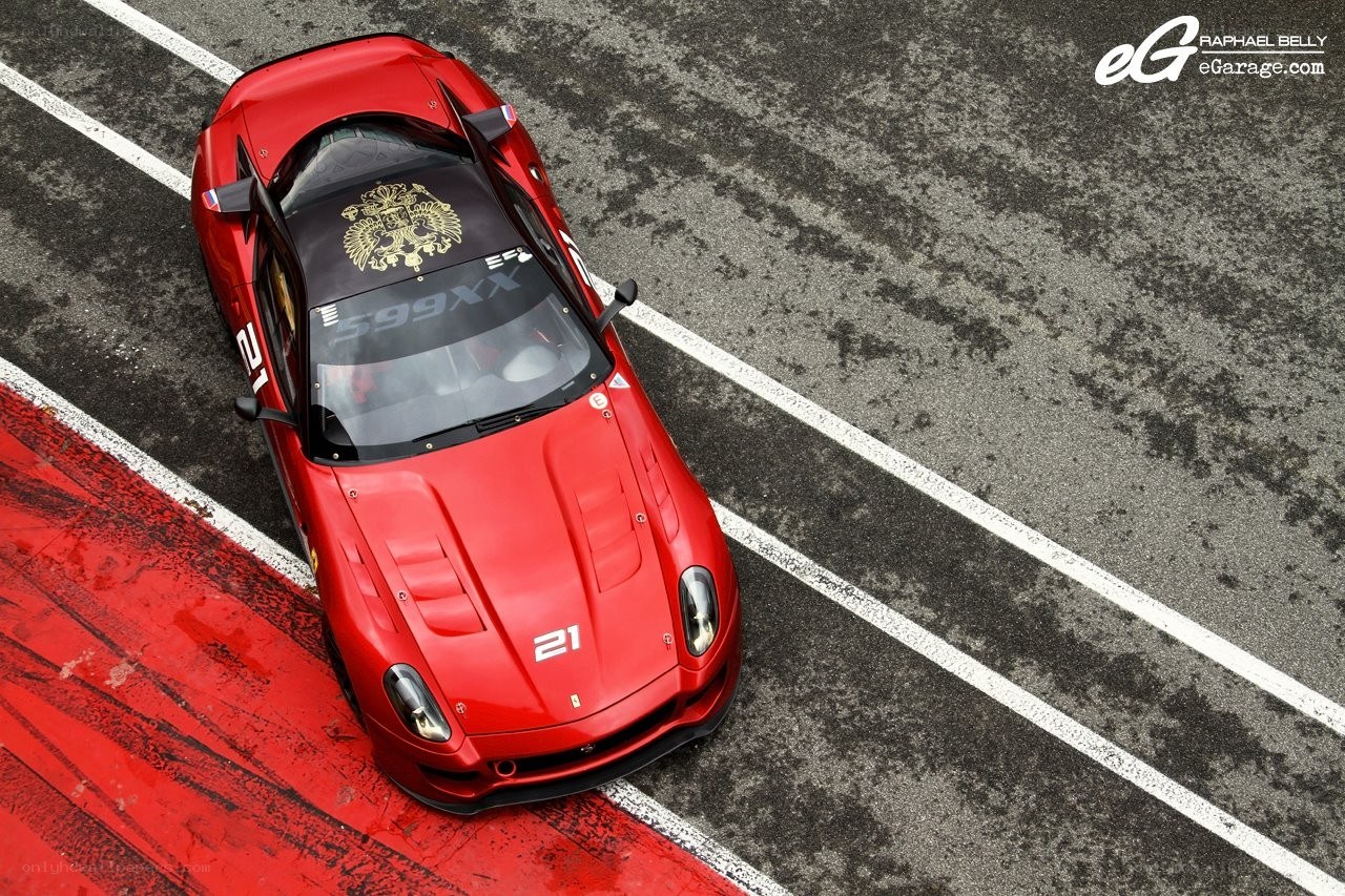 Red Ferrari on a racetrack