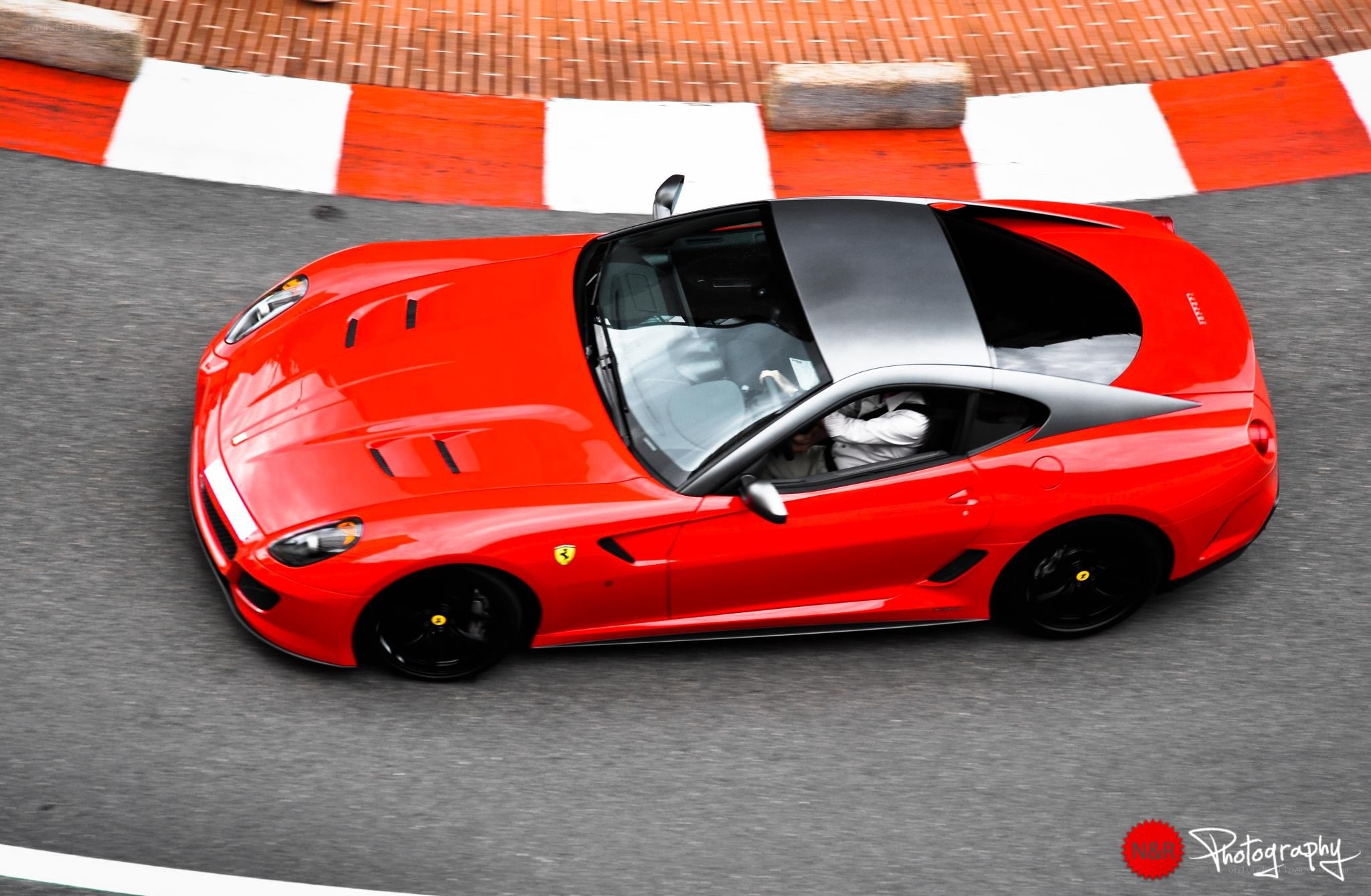 Red Ferrari on a racetrack