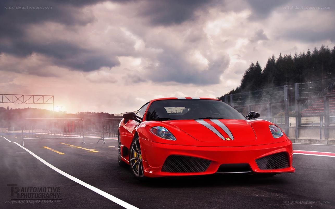 Red Ferrari on a racetrack