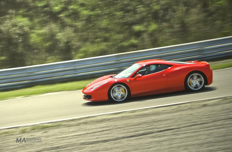 Red Ferrari on a racetrack