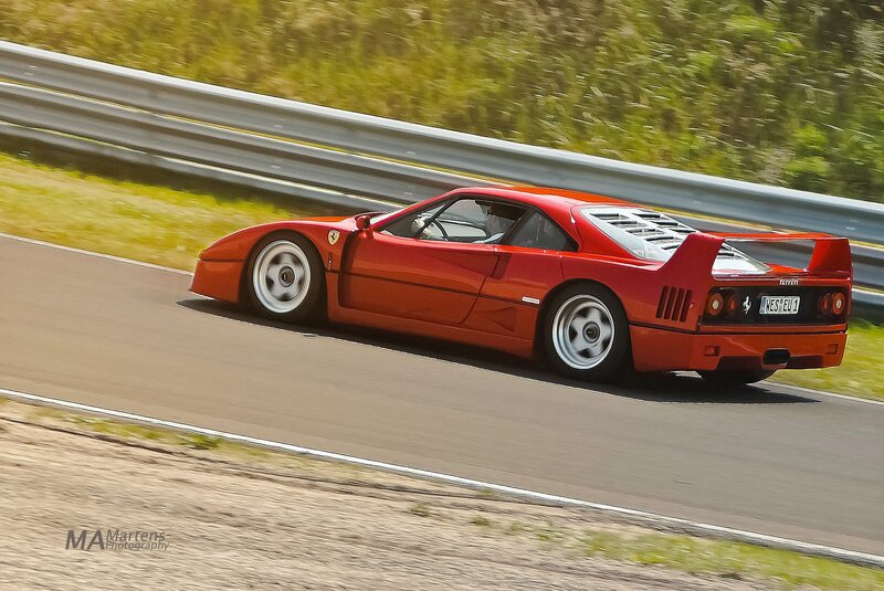 Red Ferrari on a racetrack