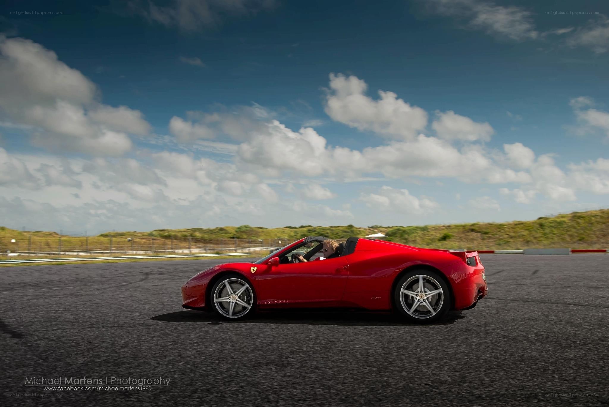 Red Ferrari on a racetrack