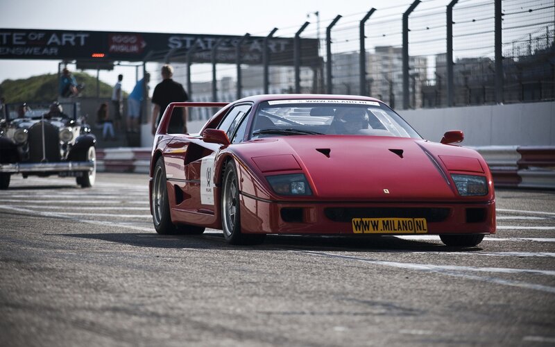 Red Ferrari on a racetrack
