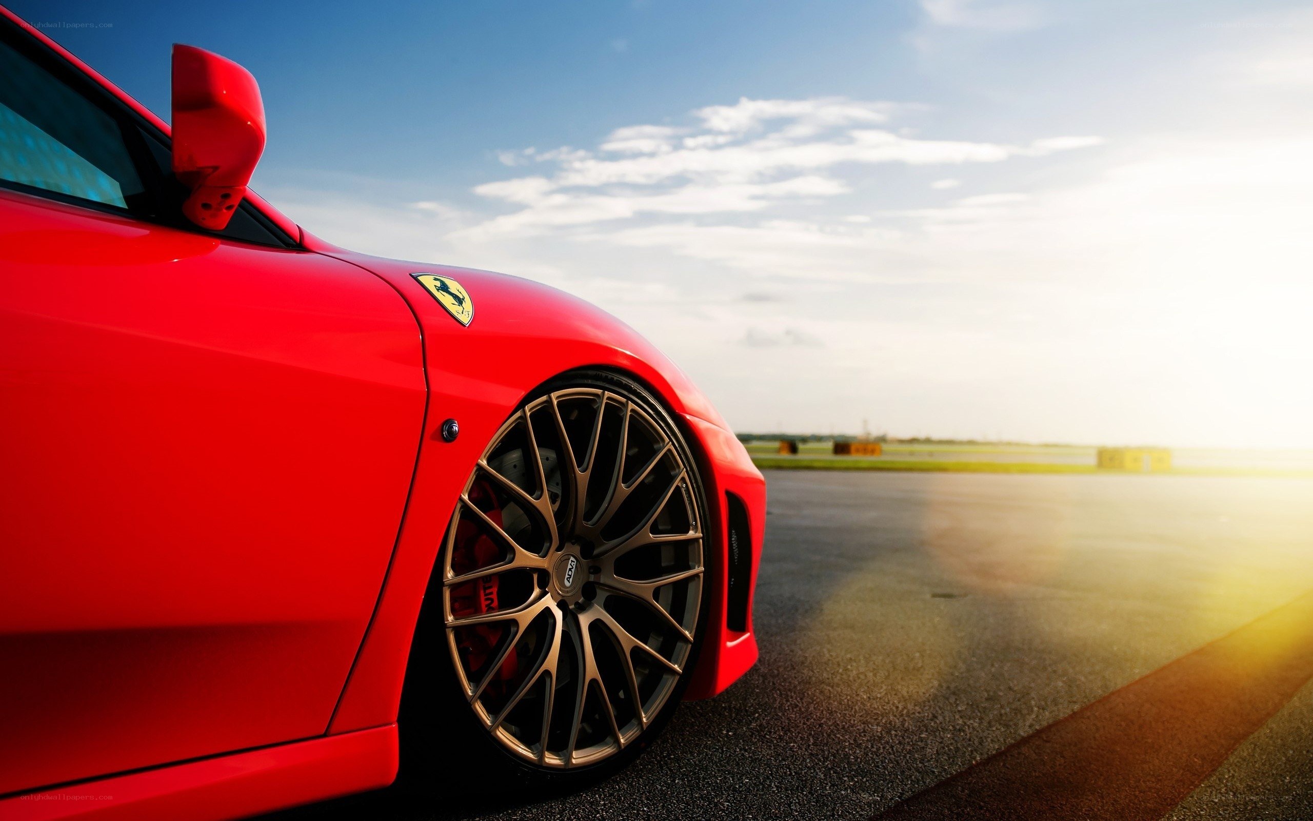 Red Ferrari on a racetrack
