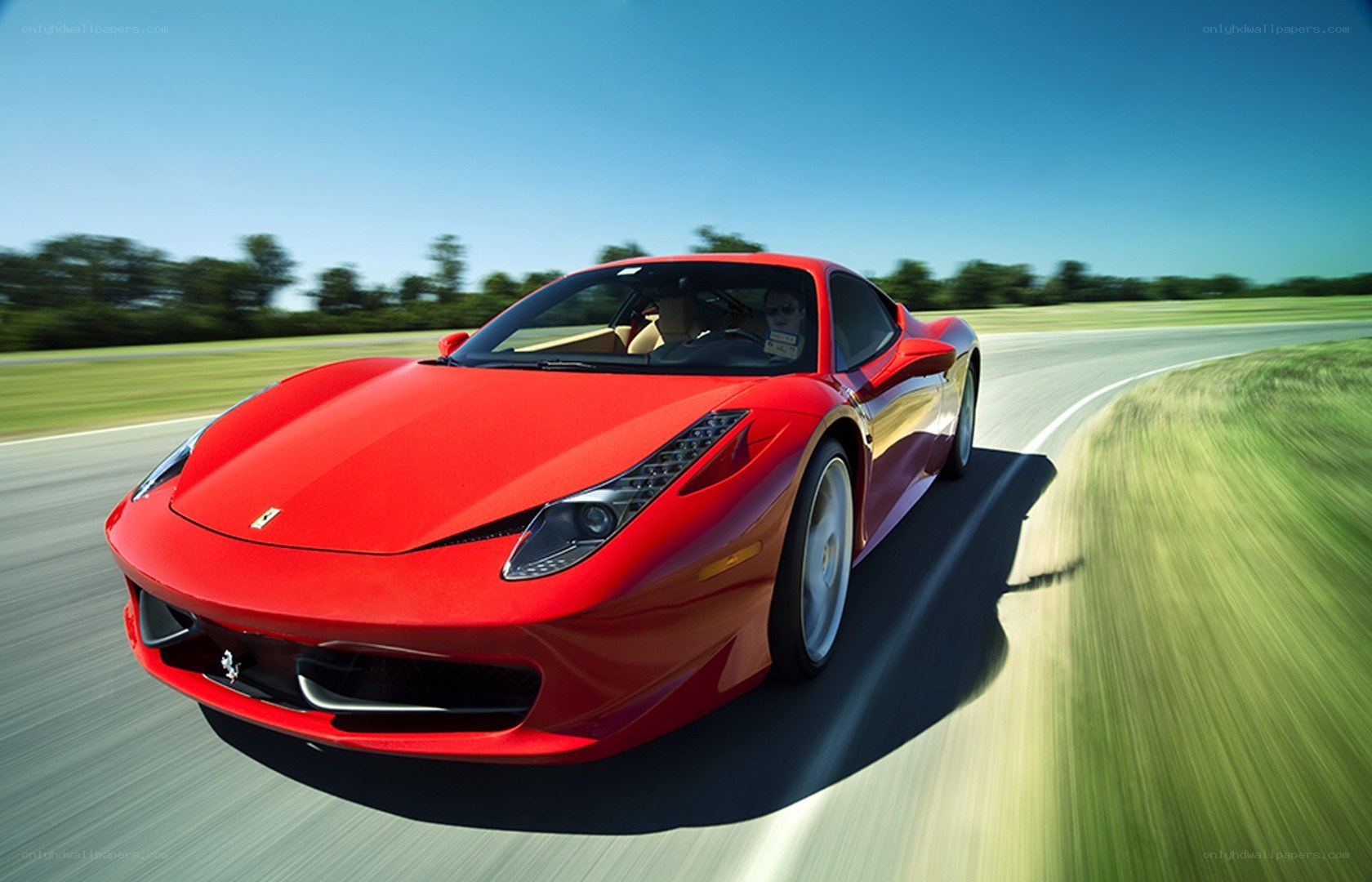 Red Ferrari on a racetrack