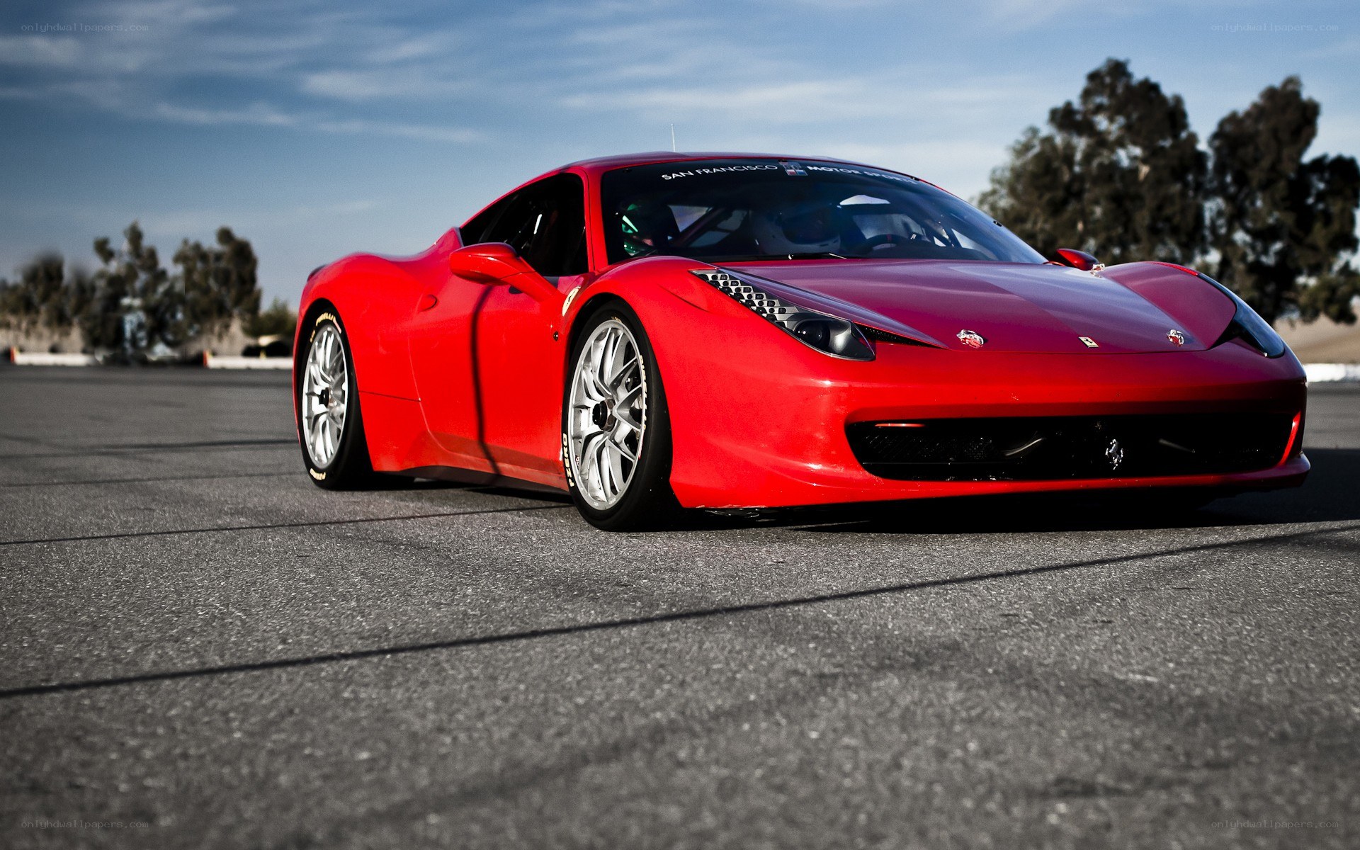 Red Ferrari on a racetrack
