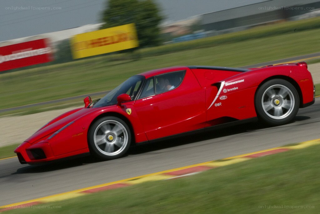Red Ferrari on a racetrack