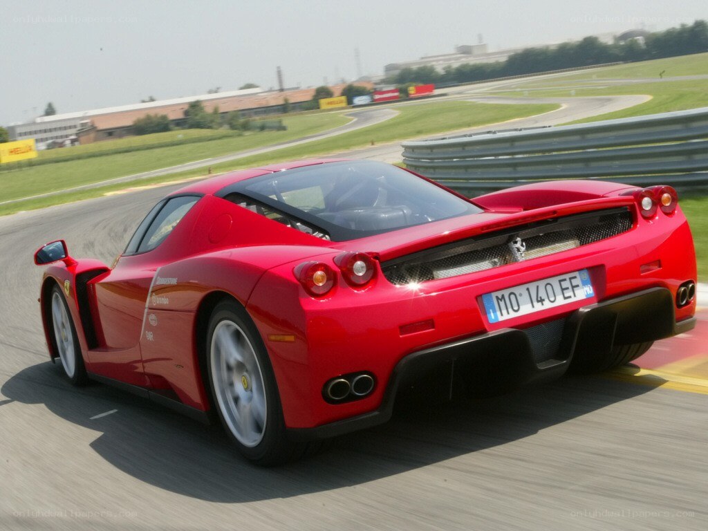 Red Ferrari on a racetrack