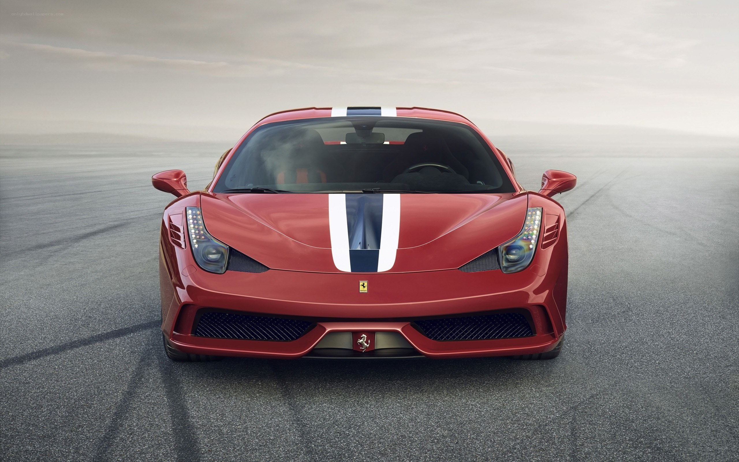 Red Ferrari on a racetrack