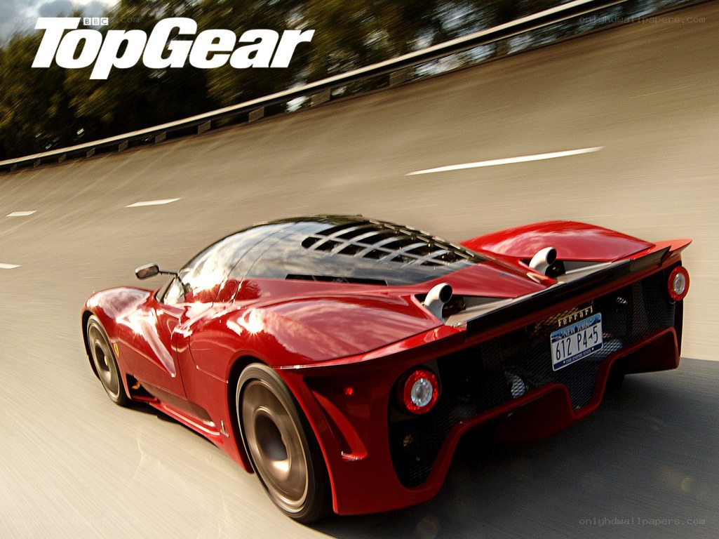 Red Ferrari on a racetrack