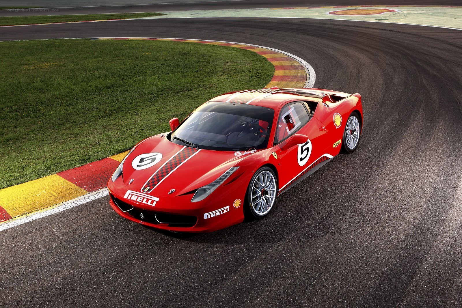 Red Ferrari on a racetrack