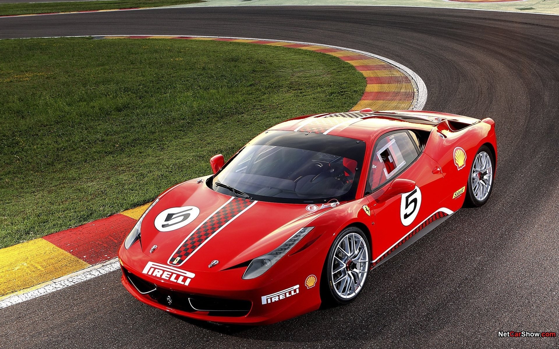 Red Ferrari on a racetrack