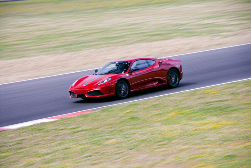 Red Ferrari on a racetrack