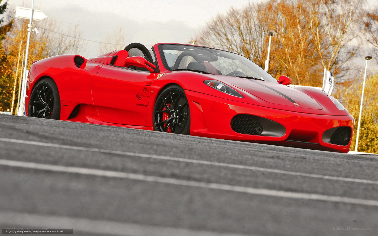 Red Ferrari on a racetrack