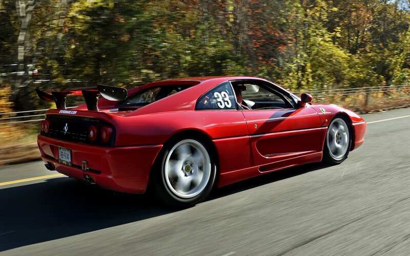 Red Ferrari on a road