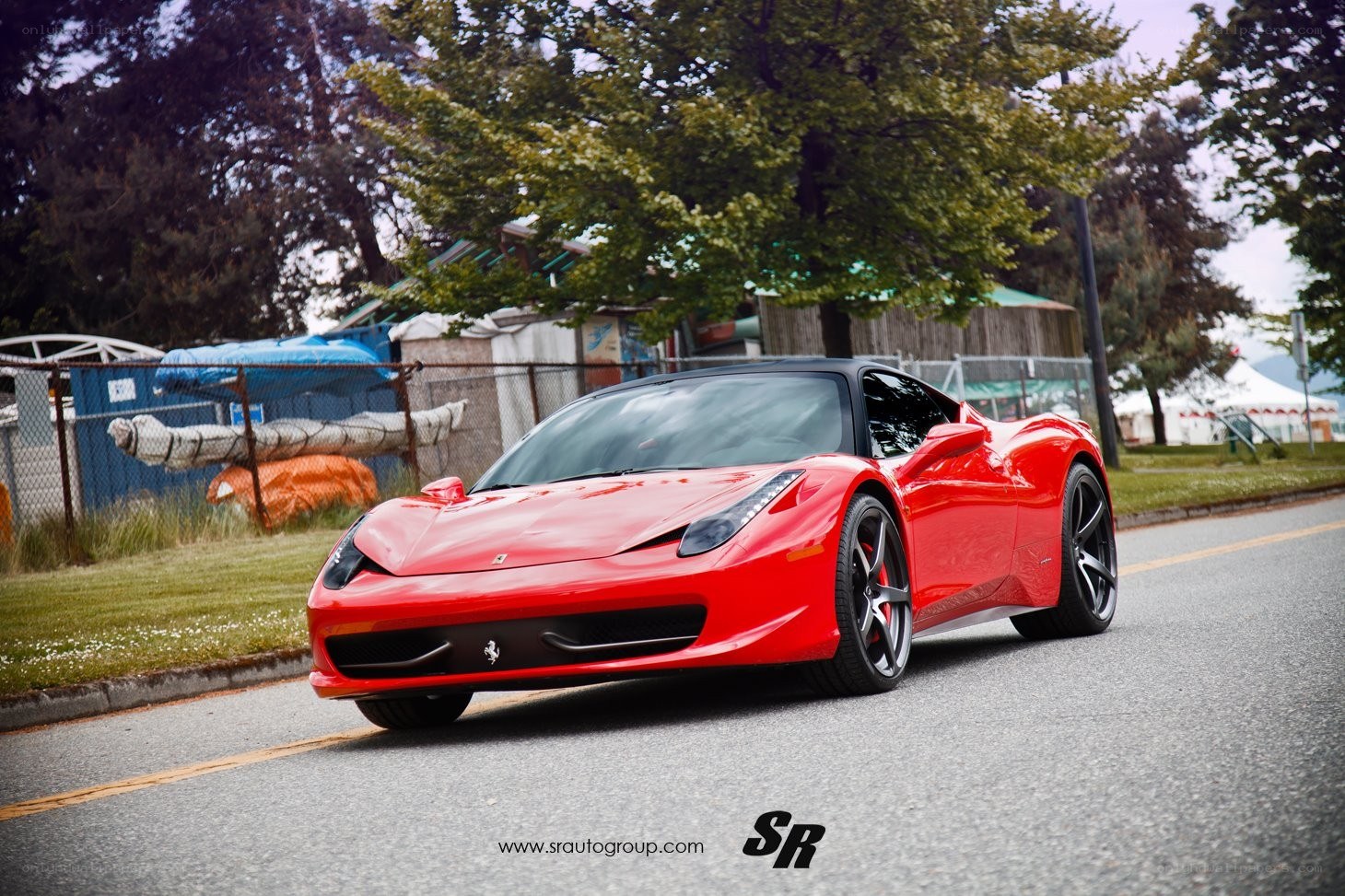 Red Ferrari on a road